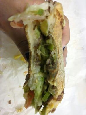 Up close and personal with my huge half of a steak and cheese sandwich $7!