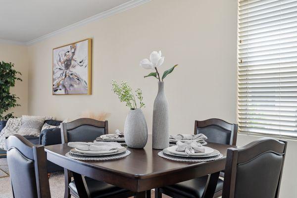 a modern open concept dining room at a Carlo, Inc property