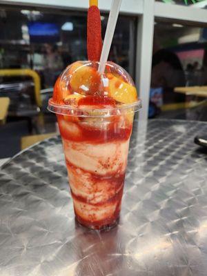 Large Mangonada. (Mexican vanilla ice cream with chamoy syrup topped with sliced mangos)