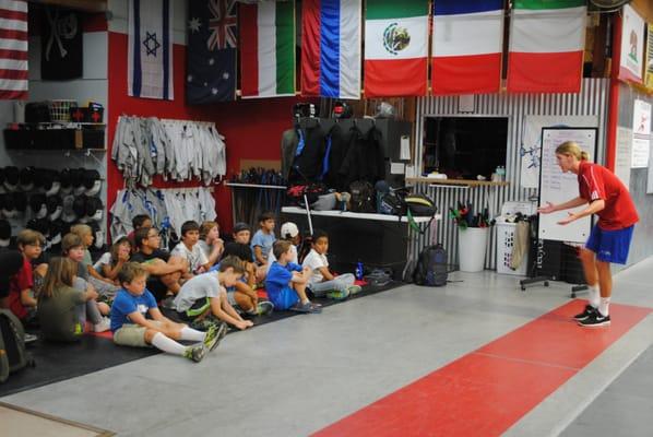 Coach Terry leading the discussion on fencing strategy