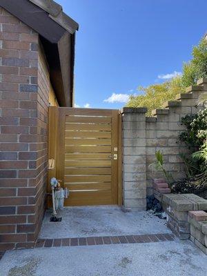 Side gate with passthrough for EV charger