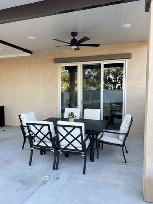 Patio cover with lights and fan.