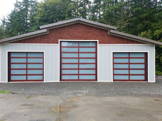 Custom cedar color metal work and laminated glass! Custom design so it all lines up!