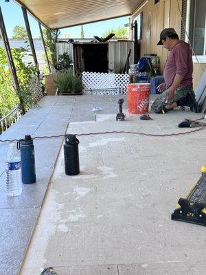 My father doing tile laying