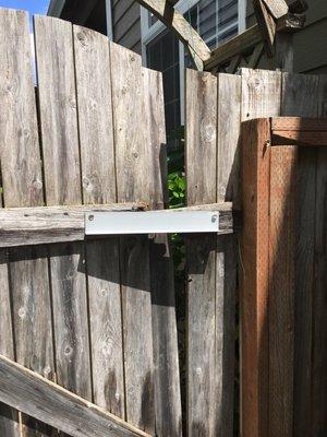 Rotted gate to backyard