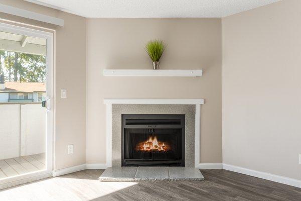 Cozy wood burning fireplace.