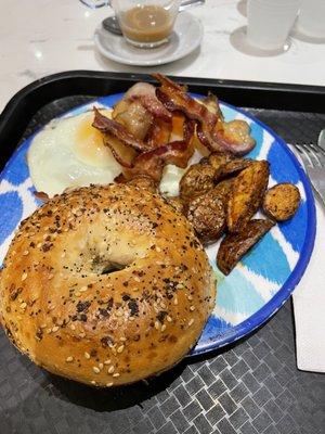 I had two fried eggs with bacon and potatoes with a everything bagel. The house brewed coffee and food was very good.