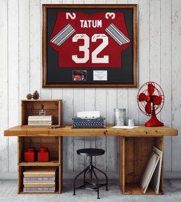 Tatum Jersey framed with photo of Tatum signing.