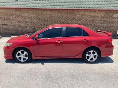 Beat the heat in this red 2012 Toyota Corolla