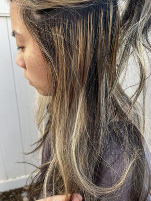 Uneven brassy color