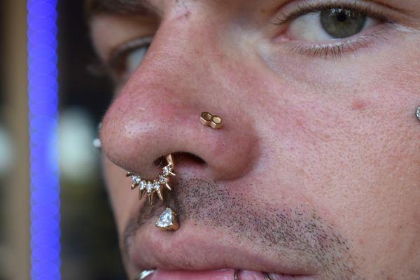 14k yellow gold adornments for this septum, nose piercings and philtrum!