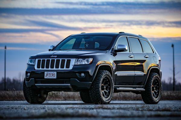 2013 Jeep Grand Cherokee with 2.5" lift, 20" KMC Wheels, and 33" Nitto Ridge Grapplers.  Rides like factory and looks amazing!