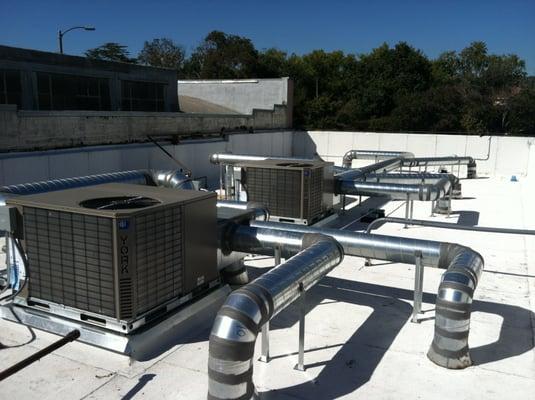 Installation of 2 roof mount package units in Beverly Hills.