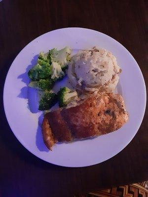 Salmon w/broccoli and garlic mashed potatoes.