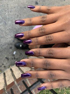 My lil sis nails by John. He did an excellent job