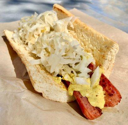 Polish Sausage with Sauerkraut, Onions, Jalapeños, and Spicy Brown Mustard. Super tasty and priced well.