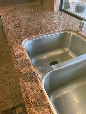 The granite piece in front of the sink had a huge crack covered with packing tape until we finally decided to have it repaired.