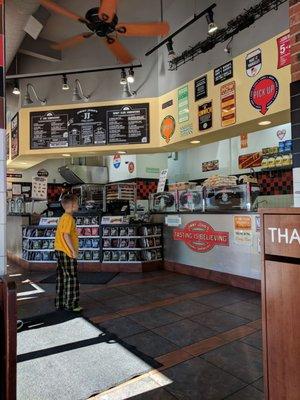 Inside. Jimmy John's no longer serves alfalfa sprouts as of this past Thursday, January 18, 2018 because of a salmonella scare. Boo.