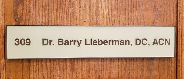 One of the best integrative doctors in Beverly Hills, office door sign