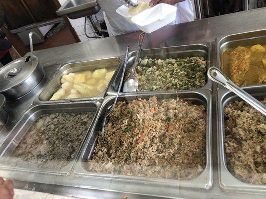 Clockwise from top left: boiled provisions, okra, fried rice