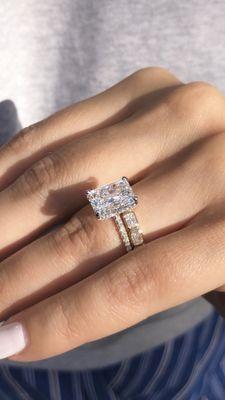 radiant cut engagement ring and an eternity diamond wedding band