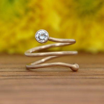 These handmade rings can be customized with various stones and metals. Come in to get one made just for you!