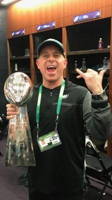 Dr. Brady, team chiropractor for the Eagles, holding the Vince Lombardi Trophy after the 2018 Superbowl