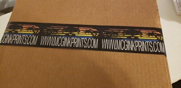 Mcg ink logo and website on our packing tape