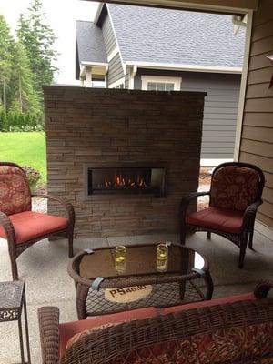 Thrilled with our new patio fireplace!