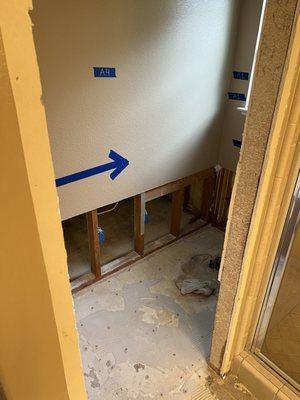 Bathroom where pipe burst, remove wet drywall to dry studs