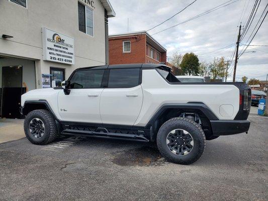 2024 Hummer with Xpel CS 15% window tint applied to the front 2 door windows to match the rears!