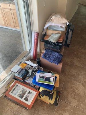 Random items piled in the kitchen.