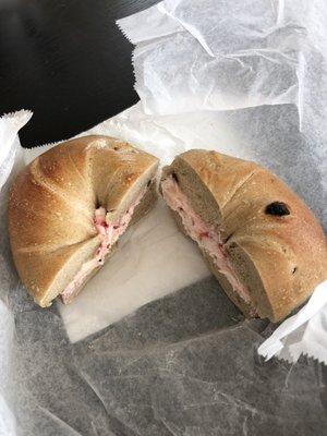 Cinnamon raisin bagel with strawberry cream cheese