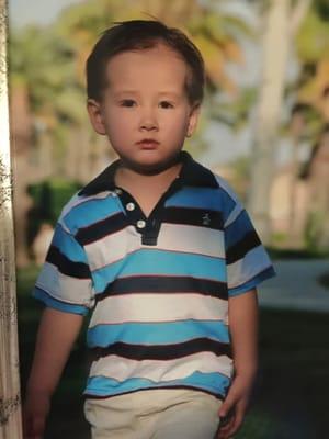 Nicholas Wang Meng, son of store mgr Steve, dapper in his Penguin boys polo.