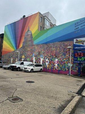 Huge rainbow mural depicting the US Capitol.