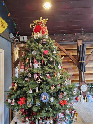 We keep our tree outside on a covered deck.