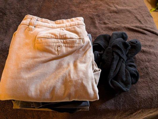 Folded pants and tucked pairs of socks!