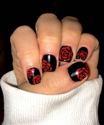 Valentine's Day nails.  I can't believe she painted these flowers by hand!