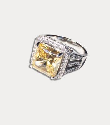 Yellow AAA Cubic Zirconia center stone with surrounding micro-pave white CZs