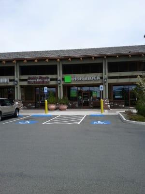 You can find H & R Block in the McQueen Crossing shopping center