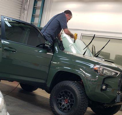 Joe scratching my new 4runner and 3rd attempt on windshield