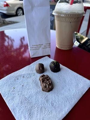 Walnut milk gianduja, pistachio truffle, rocher and iced latte.