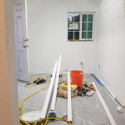 After bright white we added sheetrock level walls and add flooring