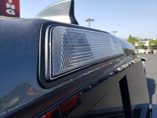 A Tacoma's third brake light I saw on the dealership lot.