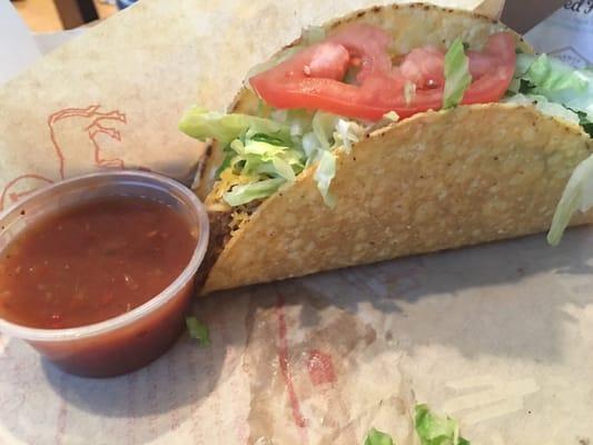 Crisp beef taco with hot sauce