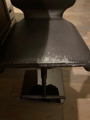 The leather on this counter stool after 4 years. It doesn't look like real leather.