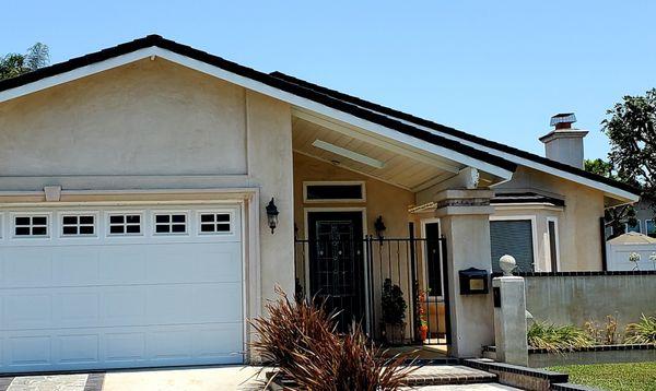 Complete and clean, new rake line shingles installed over freshly painted fascia and eaves...Nice!