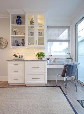 Built in desk and shelves in  open living space