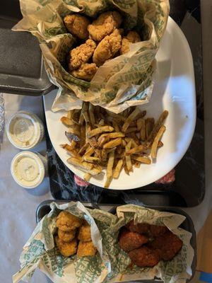 20 boneless wings (10 plain, 5 Cajun, 5 Hot Honey), ranch dip, fries.