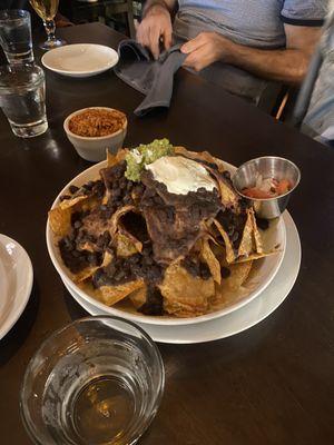 Nachos with chicken on the side